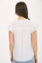 Load image into Gallery viewer, THE JANE SPLIT NECK EYELET CROCHET TRIM RUFFLE DETAIL TOP
