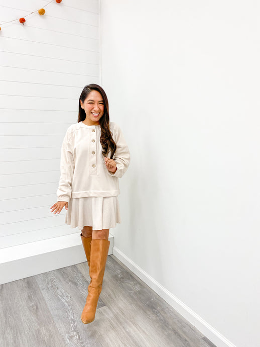 LONG SLEEVE HENLEY RUFFLE HEM MINI SWEATER DRESS