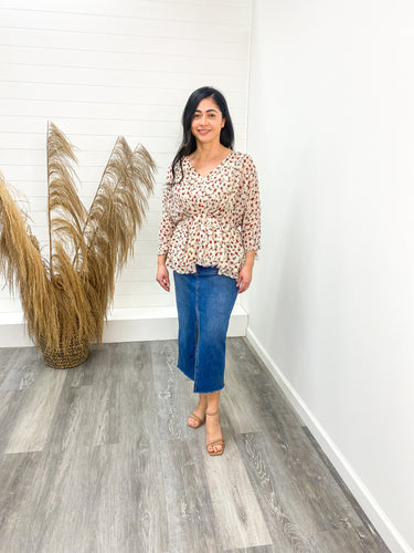 The Jayleen Dolman Sleeve Floral Peplum Top
