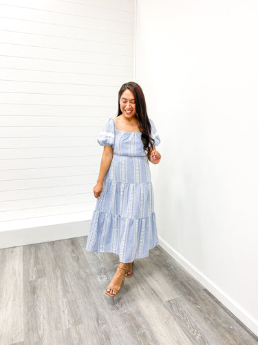 The Nyla Short Sleeve Embroidered Gingham Tiered Midi Dress with Pockets